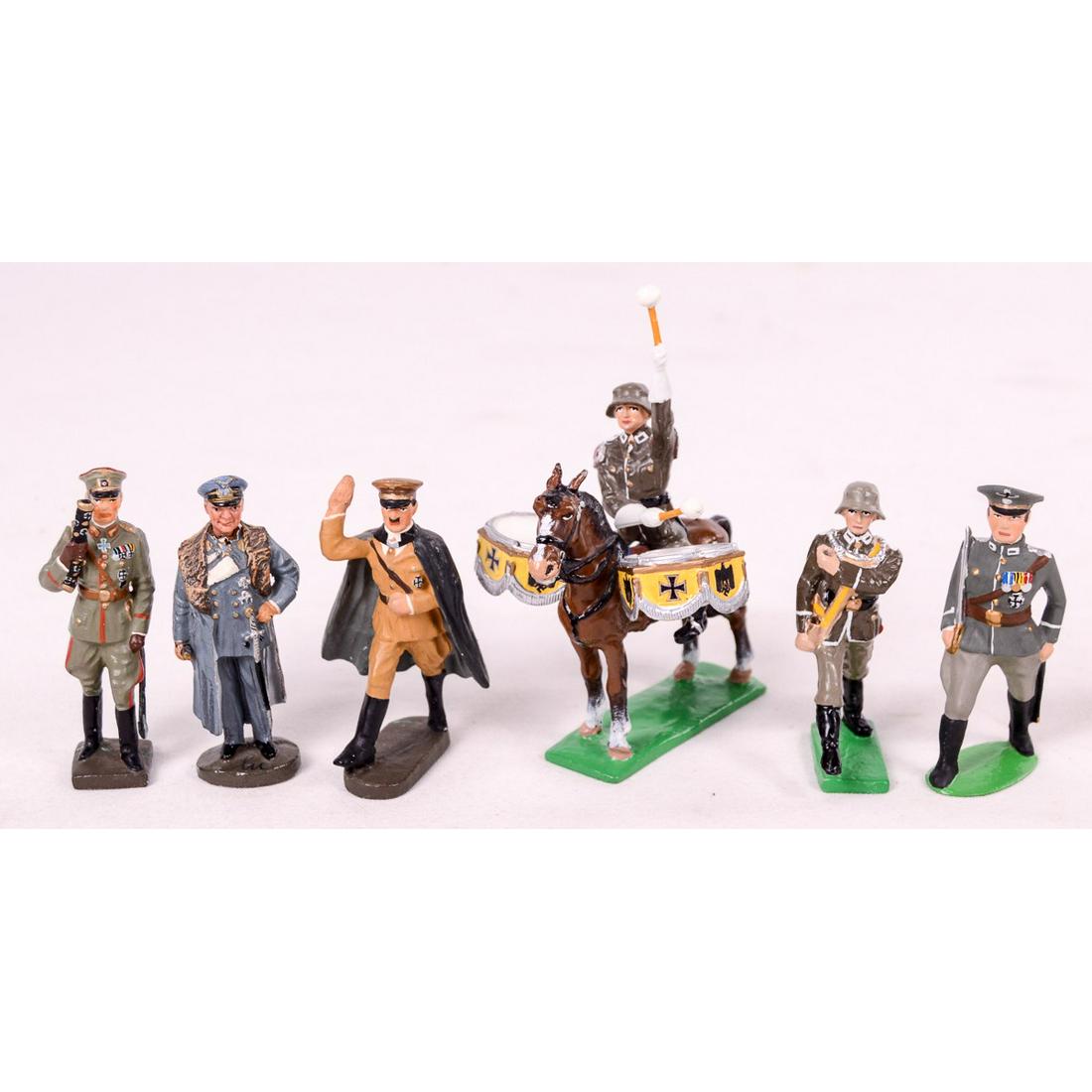 Elastolin German WWII Soldiers, Hitler Goering: Includes figures of Hitler, Goering, Soldiers, Kettle Drummer on horseback, and more. Includes figures manufactured by Elastolin, Lineol, and more. They are in excellent condition with very little wea