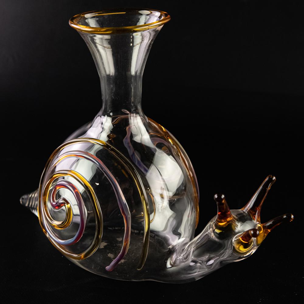 Massimo Lunardon Blown Glass Snail Water Jug: Blown glass water jug in the form of a snail by Massimo Lunardon of Italy. Signed by Massimo on the bottom and is piece number 73/99 created in 2008 . In VG condition. Measures approx 9" tall, 12" wid