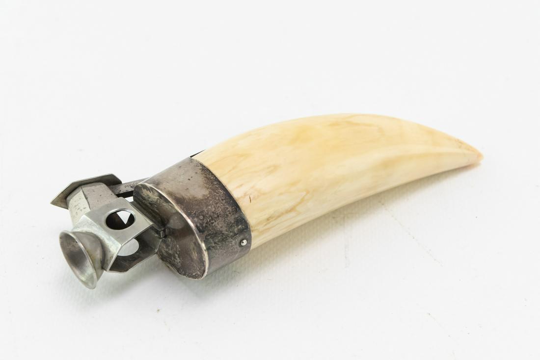 V-Notch Cigar Cutter with Tooth, Silver Fittings: This is a beautiful and fully functioning piece. It is used to cut V notches into smaller ring cigars. It is marked "Pfeilring Solingen".