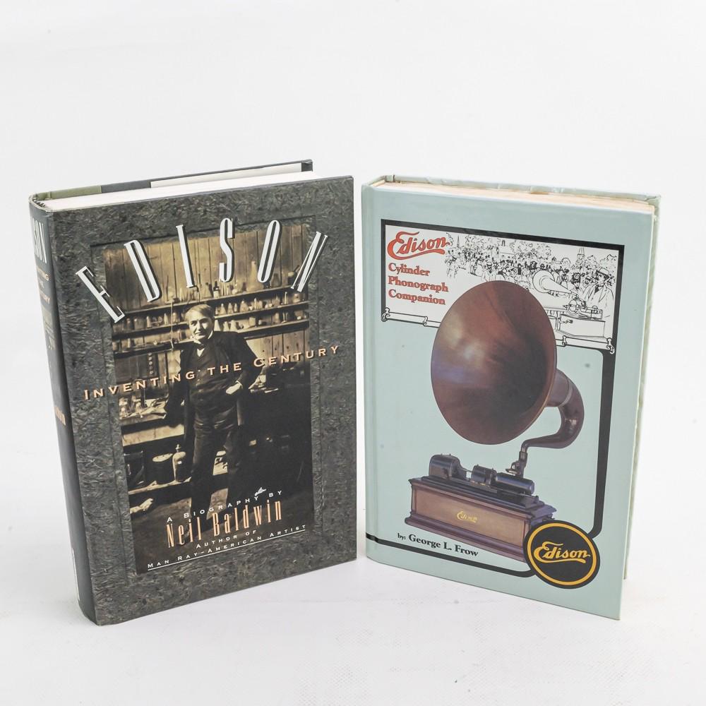 Edison Cylinder Phonograph Companion Hardcover and: Edison - Inventing the Century biography by Neil Baldwin. The phonograph book appears to have some water damage but still in good, legible condition.