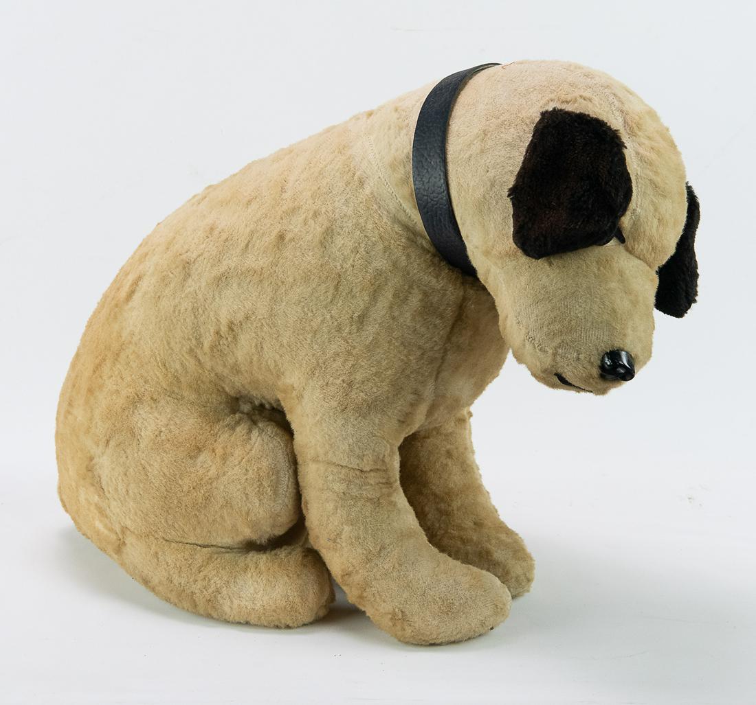 Vintage 1980s Nipper Stuffed Animal: Vintage 1980s Nipper Stuffed Animal. 17" T x 21" L. Dirty with stains. See photos.