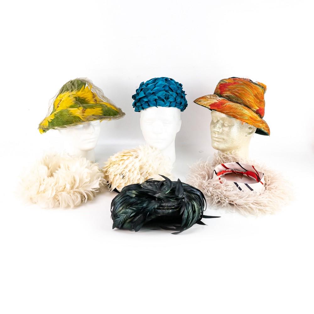 (8) Ladies 1950-1960s All Feather Hats: Each in very good overall condition with the exception of the iridescent black feather one which will require repair. Labels include The French Room, Marshall Fields, Leslie James, Oriental Millinery 