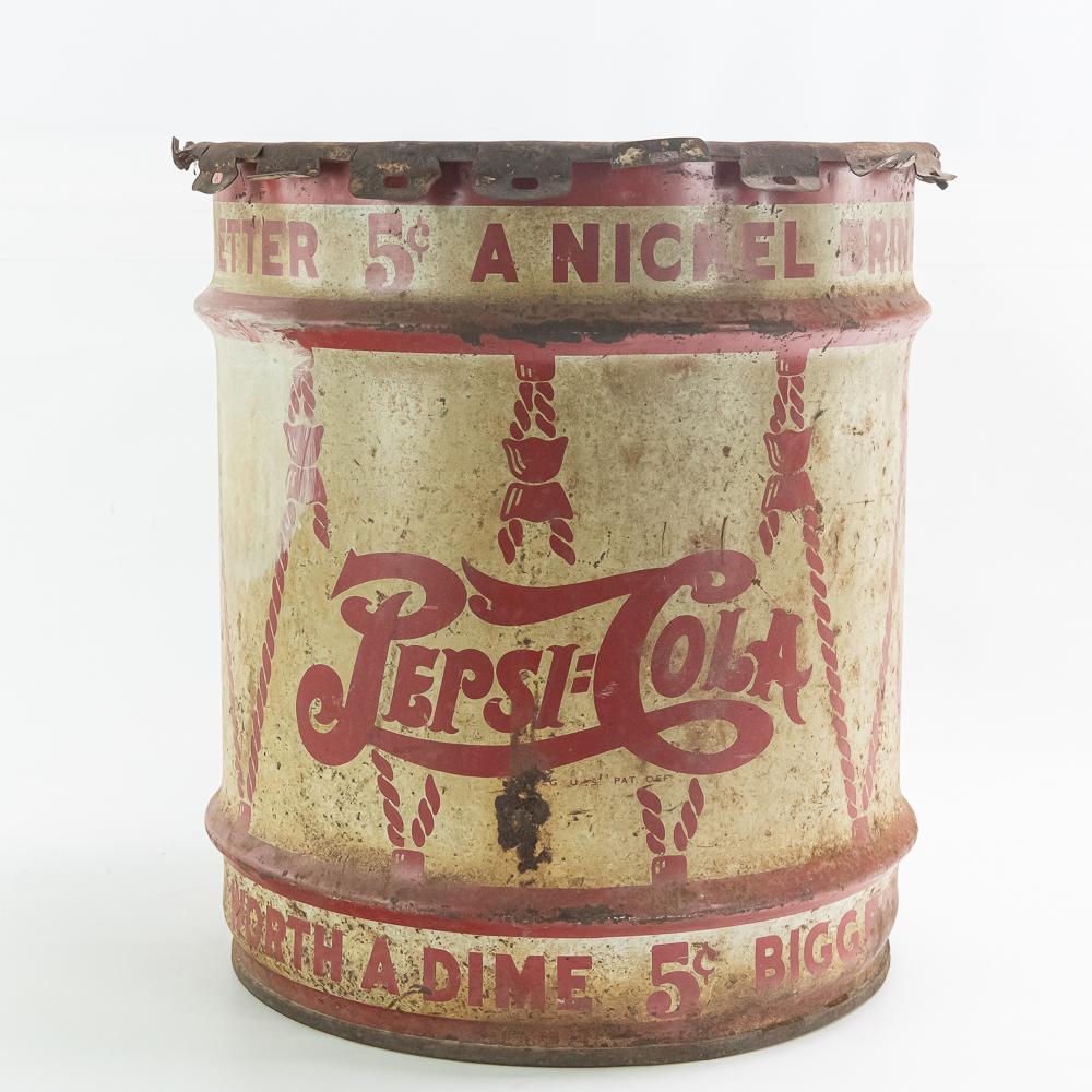 Pepsi Cola Metal Syrup Drum, Barrel: Large syrup drum with double dot, five cent, Pepsi Cola graphics. Has top but rusted. Some lite rust spots, scuffs, scratches, and some syrup stains. Overall rough to fair condition. 15 1/2"W, 17 1/2"