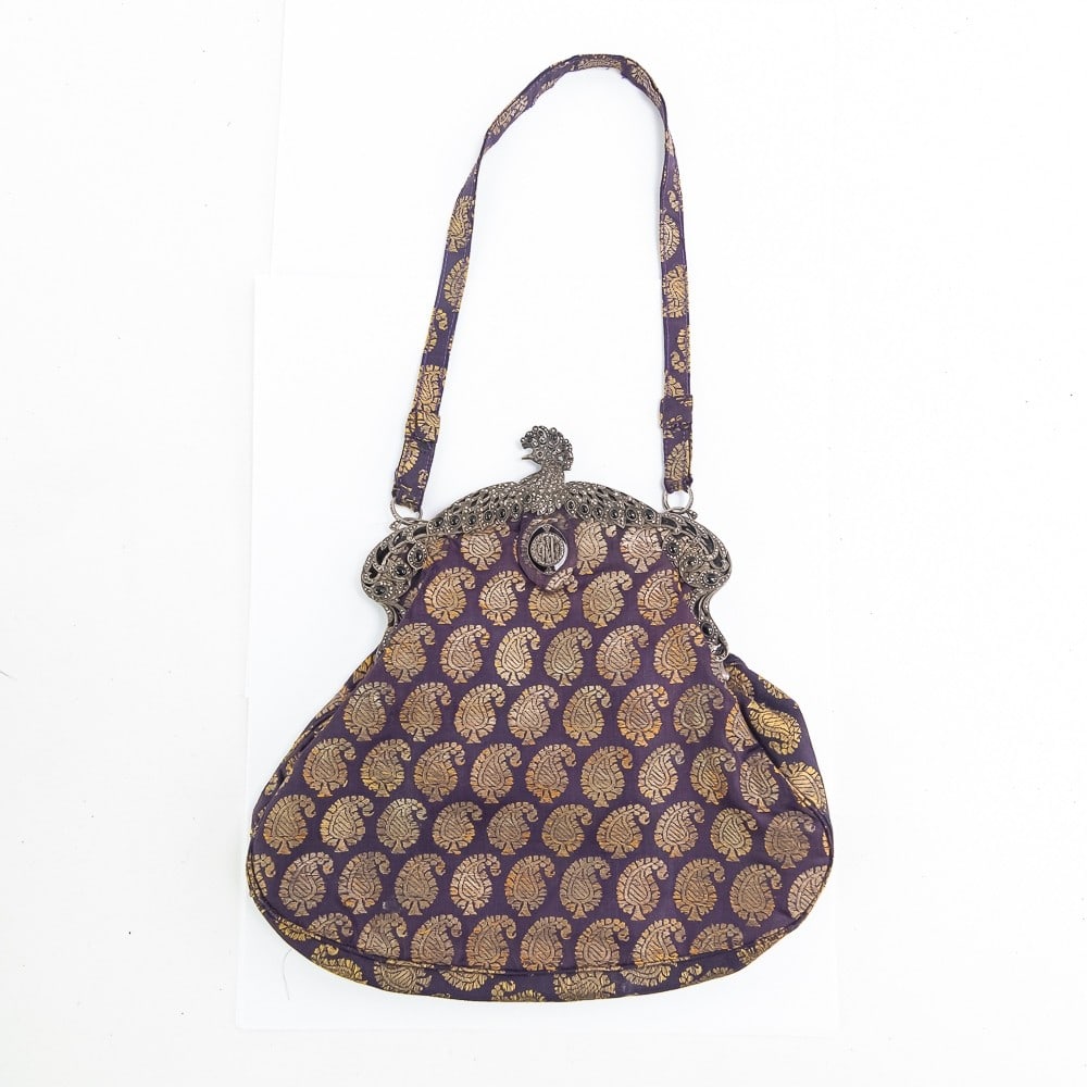 Jewel Encrusted Evening Bag w/Peacock Clasp: Breathtaking!!! Late 1800s-1910s The entire silver frame of this bag is covered in shimmering marcasite and what appear to be polished black onyx stones. A Delicate profile of a peacock identifies the