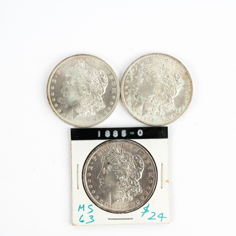 Unc. 1884-O, 1885-O &1904 Morgan Silver Dollars (1 of 8)