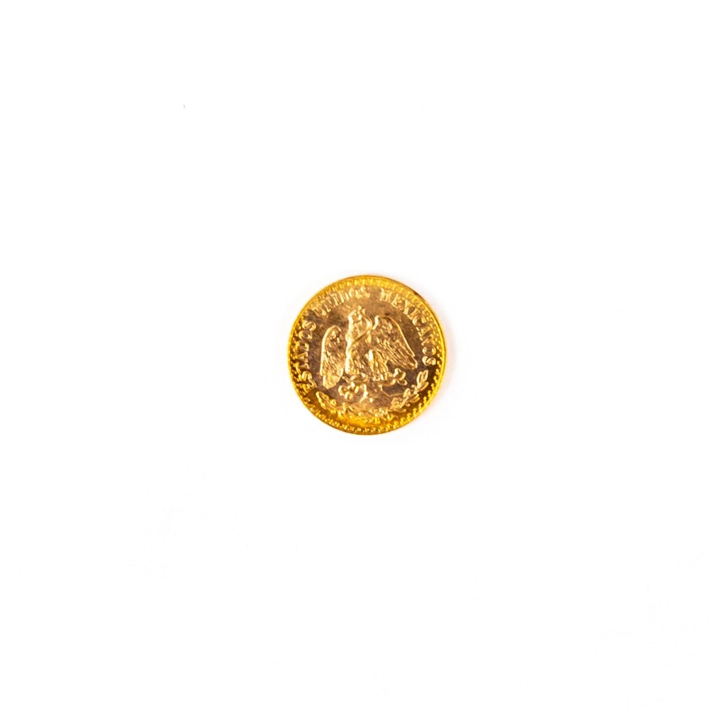 Unc. 1945 Mexico Dos Pesos Gold Coin .0482 Ozt: Eye catching uncirculated 1947 Mexico Dos Pesos 0.0482 ozt gold coin. Lots of luster present. Please use photos to judge condition and bid accordingly. Perfect hedge against rising inflation. Great In
