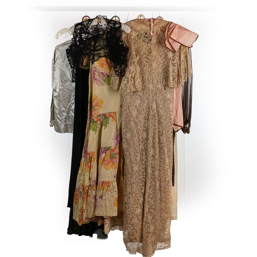 13 Piece 1930's Collection: 8 formal length slips/nightgowns in various sizes, good condition. Also included is a great taffeta, bright floral, front wrap, dressing gown in excellent condition. A black lace bolero vest in VG con