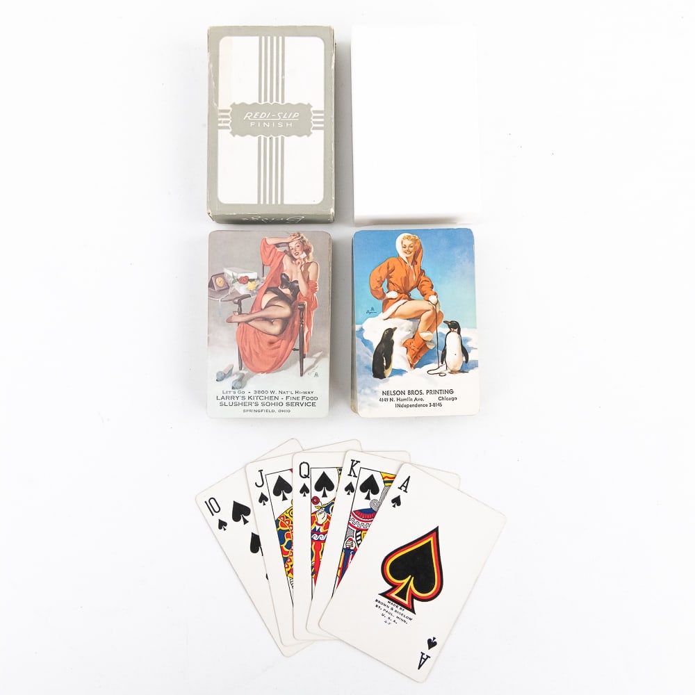 (2) Decks of Brown & Bigelow Pin Up Playing Cards: Collection of (2) opened Brown & Bigelow pin up girl advertising "Remembrance" & Redislip bridge playing cards. Remembrance deck includes original box while Redislip comes with general white box. Hard