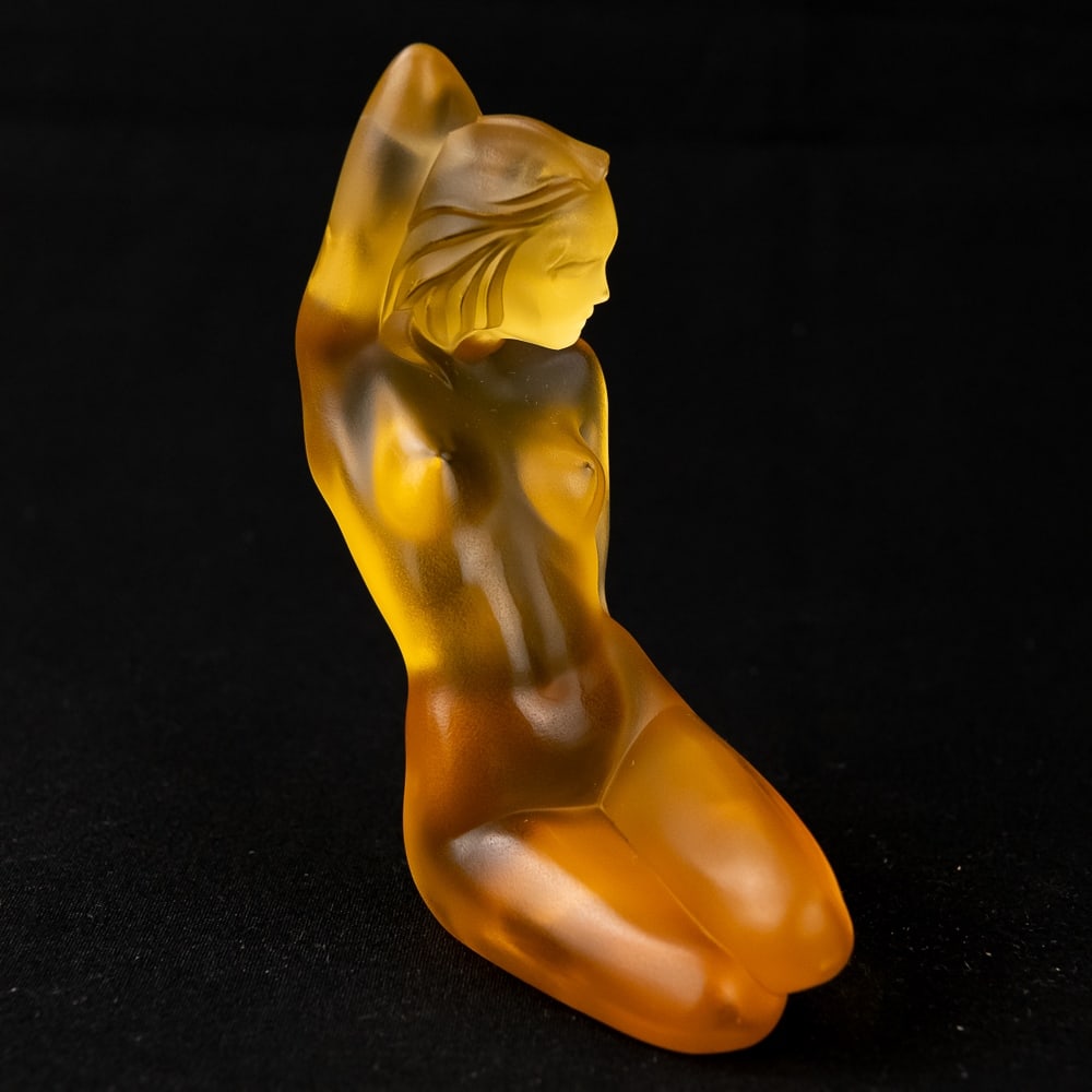 Lalique Petite Nue Antheia Ambre Nude Statuette: This Lalique "Petite Nue Antheia Ambre" nude figure is a beautiful and elegant example. Limited edition number 140 of 999.This gorgeous piece is in very good condition with no chips or cracks noted. S