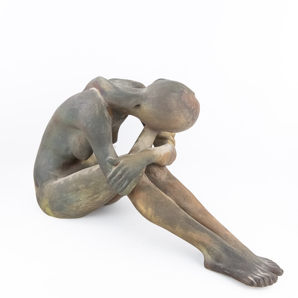 George Tudzarov "Zaro" Nude Female Raku Sculpture: George Tudzarov "Zaro" seated nude woman Raku sculpture. Lovely eye catching art deco design made of fired clay with iridescent finish. Very good to good condition with a small stray mark present on t