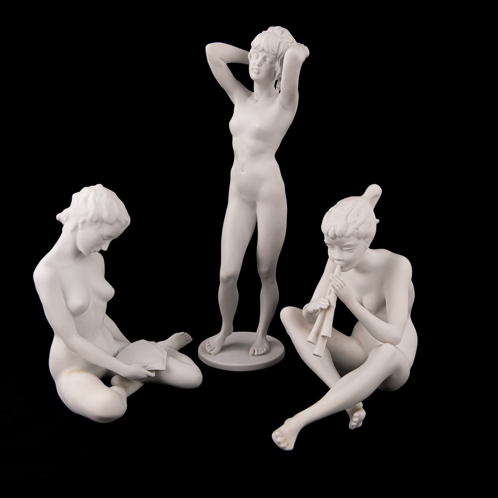 Kaiser Nude Bisque Statuettes #385 + #778 + #551: Collection of (3) Kaiser West Germany bisque nude statuettes. Specifically Kaiser bisque porcelain nude "Flute Player" #385", Kaiser bisque porcelain "Woman After Bath #551" and Kaiser bisque porcelai