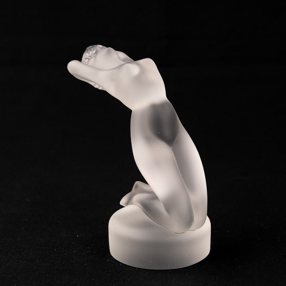 Lalique "Chrysis" Frosted Nude Woman Sculpture: Beautiful Lalique France Art Deco style figurine known as Chrysis. A frosted nude in the hood ornament or "woman on hood" mascot style, as if bent back in the wind or breeze. Stands 5.5" tall and in v