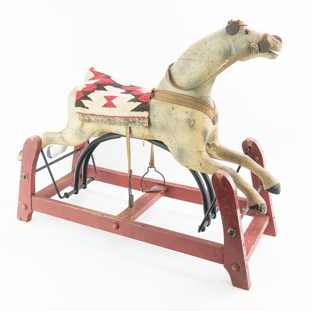 Child's Antique Rocking Horse: *NO SHIPPING! - PICKUP OR BUYER TRANSPORT ONLY* Overall good condition on this wooden rocking horse. Some paint loss along with two leg repairs. The saddle under the blanket shows wear. The base is 13