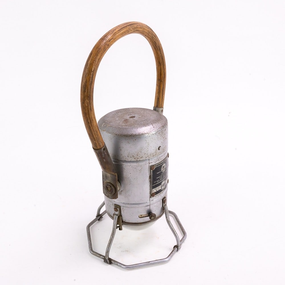 Economy Electric Ecolite Lantern: 11.5" T with wood handle extended. Lens is intact - in good condition with only normal wear.