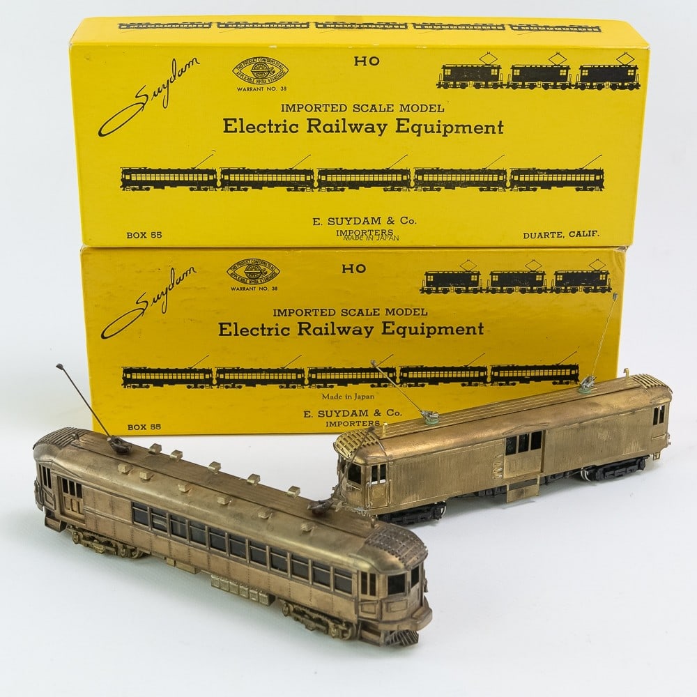Suydam #215 & #251 Brass Chicago North Shore Cars: Hard to come by Suydam #215 & #251 HO scale beautiful brass Chicago North Shore railway cars. #215 appears new in open box while #251 appears new in open box w papers no box "filler" included. Please