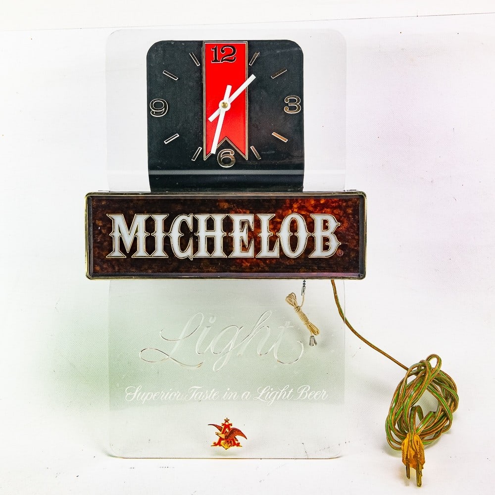 Vintage Michelob Beer Advertising Wall Clock: Very nice vintage Michelob Beer illuminated advertising wall clock. Good overall working condition with light surface wear present; indicative of age and use. Approximately 11.5"l x 18" t 3.5"d. Pleas