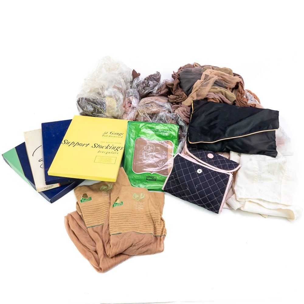 Huge Box of Stockings 1920-1960: There are over 50 pair of mostly seamed stockings in this box. Some individually wrapped, some loose, some new in box and some new with tags and no box. New and used. Sizes vary - 9-1/2, 10, 10-1/2, 1