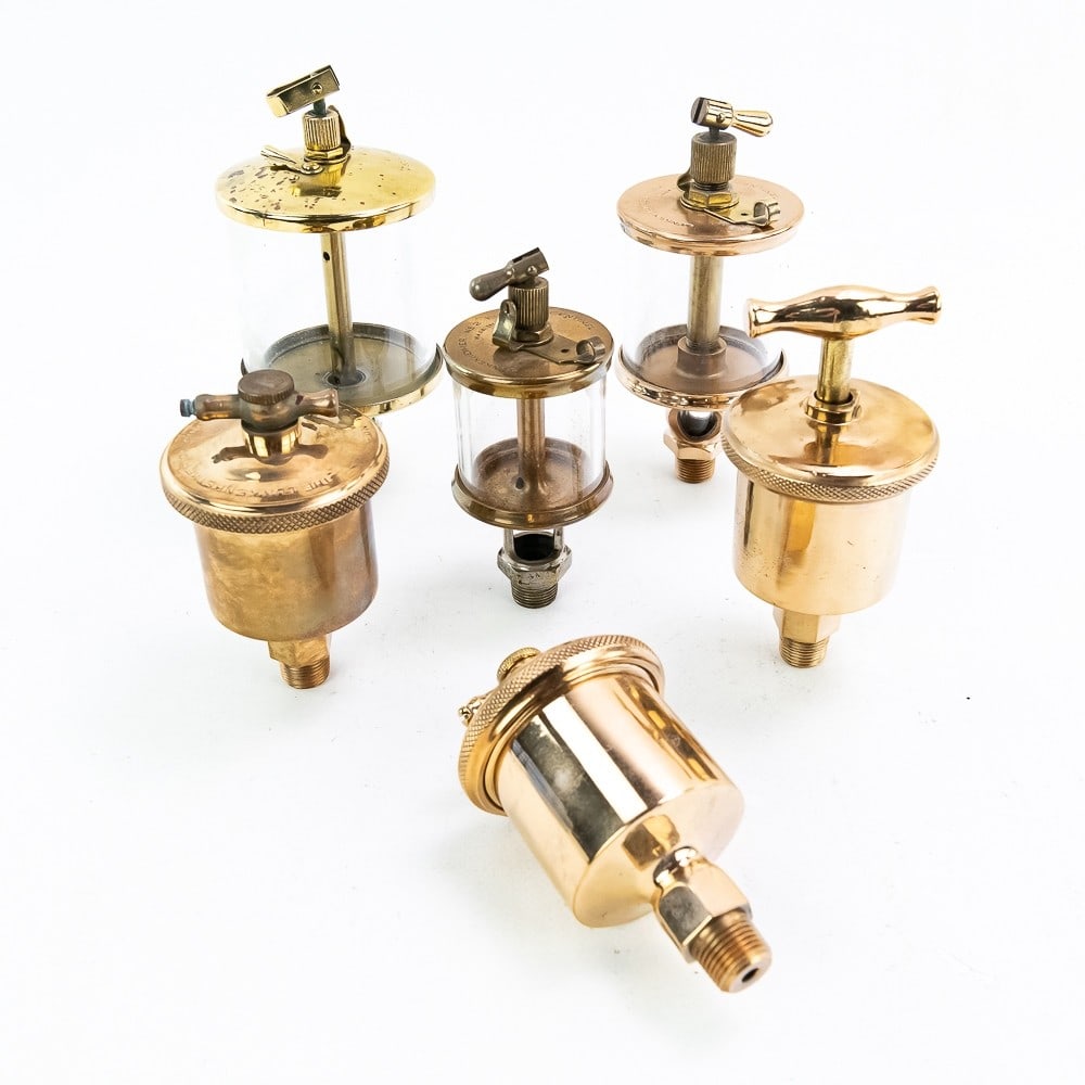 Collection of Brass T Handle Grease Cups & Oilers: Including Detroit Lubricator #605, Lunkenheimer Sentinel No. 4, Lunkenheimer No. 2 Fig 1300 Sentinel (Missing glass on bottom tank) brass & glass oilers & (2) Lunkenheimer Ideal No.2 and additional No