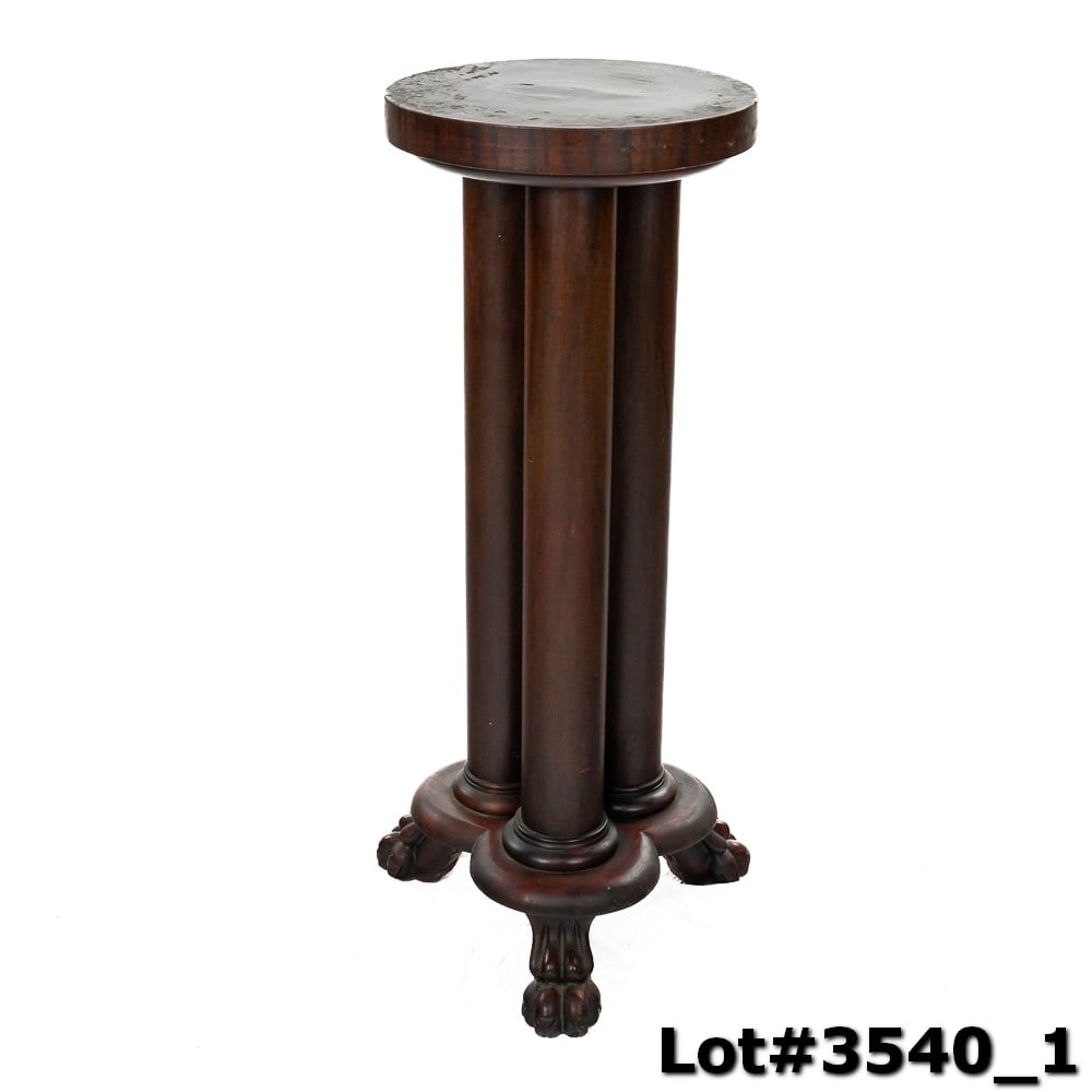 Mahogany Pedestal: Empire style triple column pedestal with paw footed base. In VG condition. Measures 36" tall, 14" diameter top