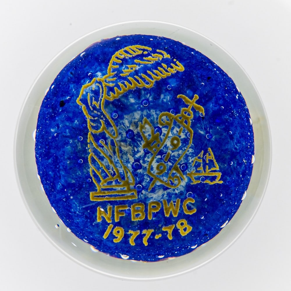 Glass NFBPWC Souvenir Paper Weight: Glass 1977-78 National Federation of Business and Professional Women's Club Paperweight, in great condition with minimal signs of wear. Has blue cobalt bottom with a yellow display and text that reads