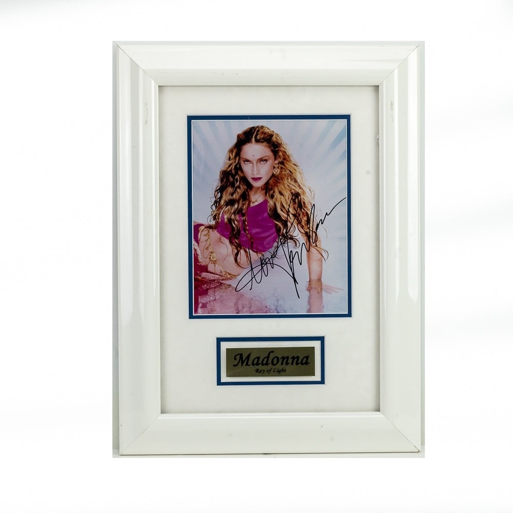 Madonna "Ray of Light" Photograph Signed: With letter from Antiquities of NV Inc. 15 1/4" X 20 5/8" Note: Donley Auctions does not warranty any third party COA's or authenticity.