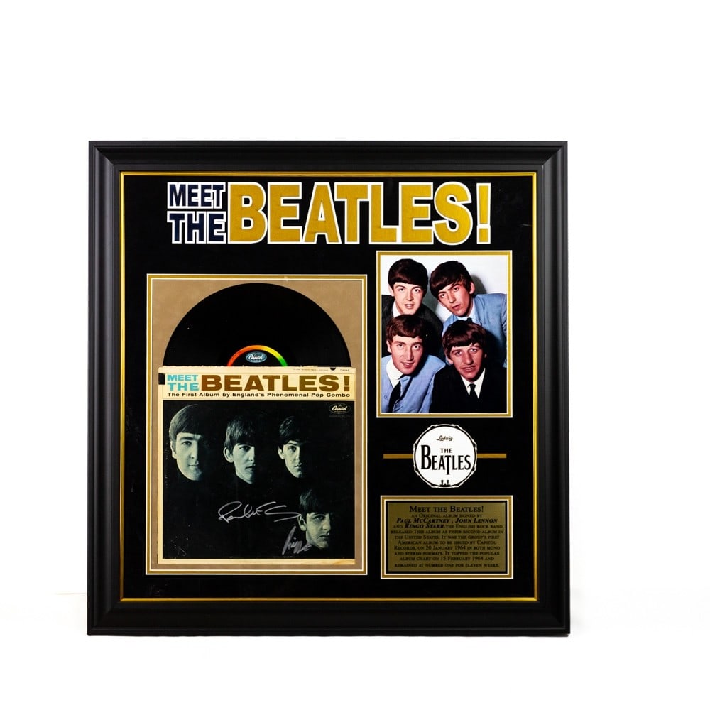 "Meet The Beatles" Signed LP Jacket 1964: Original 1964 "Meet The Beatles!" LP album. Paul McCartney, John Lennon and Ringo Starr signatures. Group photograph and COA issued by Guaranteed Forensic Authenticators LLC included. 29 7/8" X 30 3/4