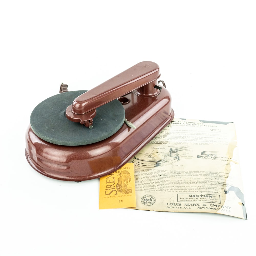 Toy Electric Disc Phonograph By Louis Marx: Circa 1950's Model 3640-2650 Portable Electric Phonograph made by Louis Marx of new York. Marx was famous in the 1940's - 60's for children's toys .Unit is in like new condition. 78 RPM turntable runs