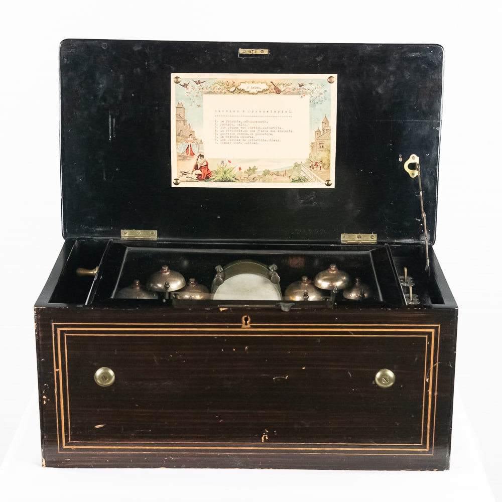 Lith Picard Swiss Cylinder Music Box: 8 tune box winds and plays well with drum and six bells. Changes tunes. Comb has no broken or chipped teeth. Glass dust cover and tune card intact. Inlaid case in good original finish with expected we