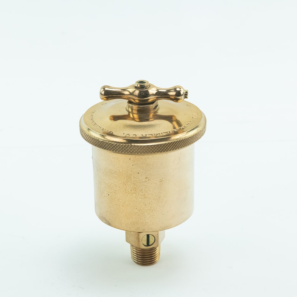 Lunkenheimer Ideal No. 3 Brass Grease Cup: Lunkenheimer Ideal No. 3 brass grease cup in very good condition with some marks and light scuffs. It is approximately 6" inches tall and the brass cylinder cup is about 3" inches wide. The T handle i