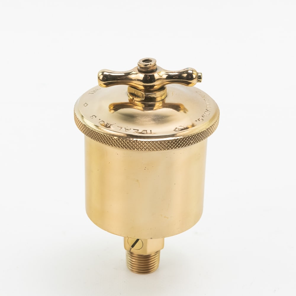 Lunkenheimer Ideal No. 3 Brass Grease Cup: Lunkenheimer Ideal No.3 brass grease cup in very good condition with some marks and light scuffs. It is approximately 5" inches tall and the brass cylinder cup is about 3" inches wide. The T handle is
