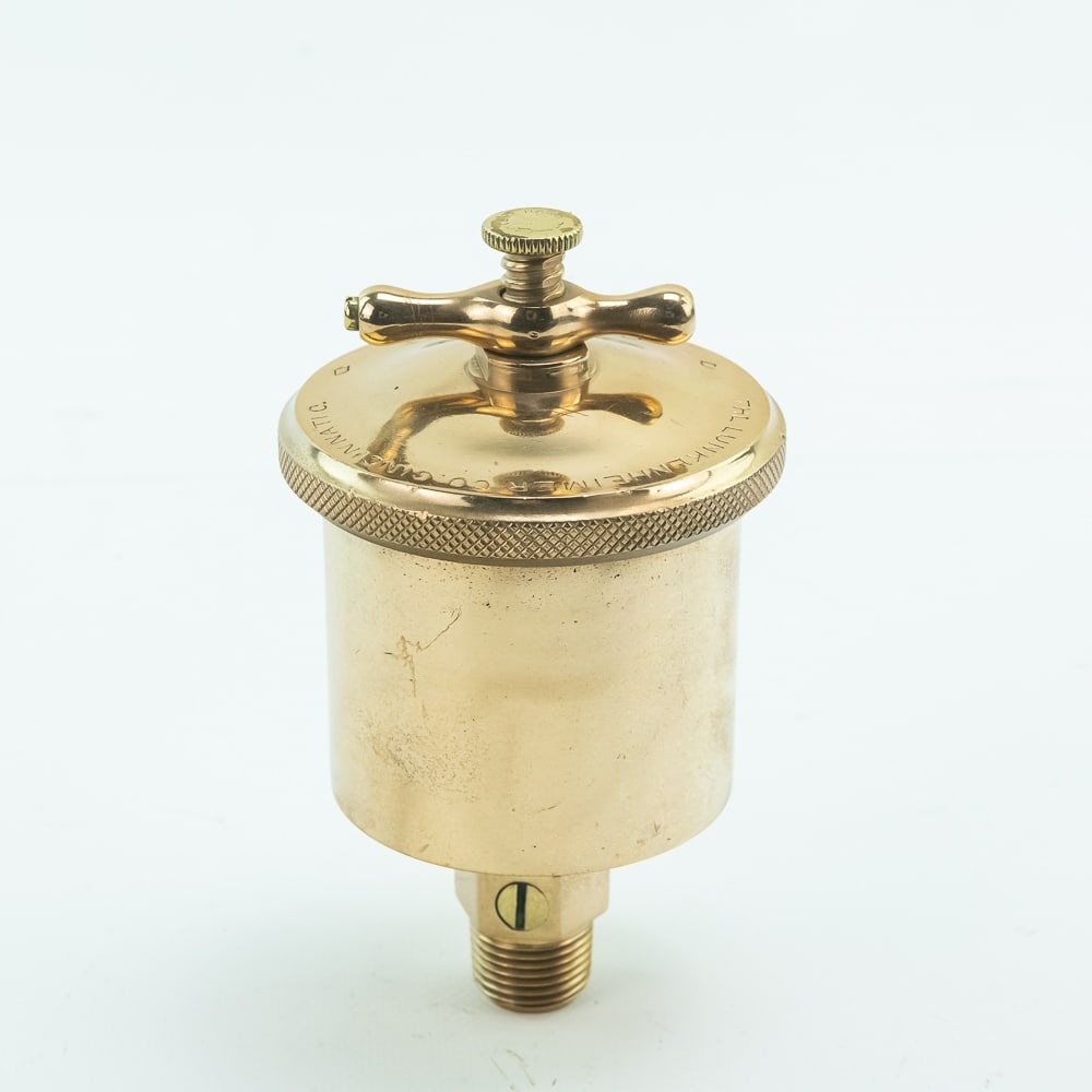 Lunkenheimer Ideal No. 3 Brass Grease Cup: Lunkenheimer No. 3 brass grease cup in very good condition. It is approximately 6" inches tall and the brass cylinder cup is about 3" inches wide. The left hand knob is in good condition and works smo