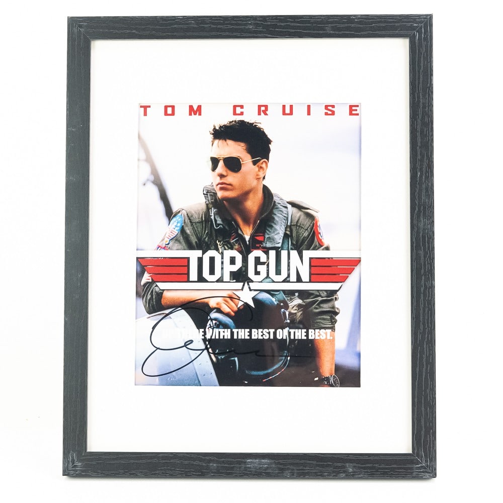 Framed Tom Cruise Autographed Top Gun Photo w COA: Tom Cruise autographed framed Top Gun photo. Approximately 15.25"l x 12.25"w with COA. Perfect Addition to your collection, please use photos to judge condition and bid accordingly.