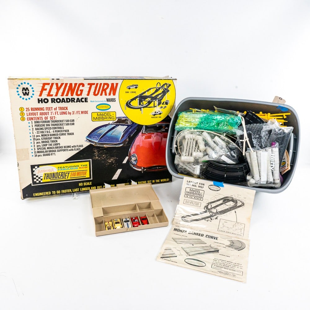 Vintage Aurora 500 Motor Thunder Jet Slot Car Set+: Very nice vintage Aurora 500 Motor Thunder Jet Flying Turn slot set, appears complete and in very good overall condition still showcased inside original opened packaging. Additional Aurora Model Motor