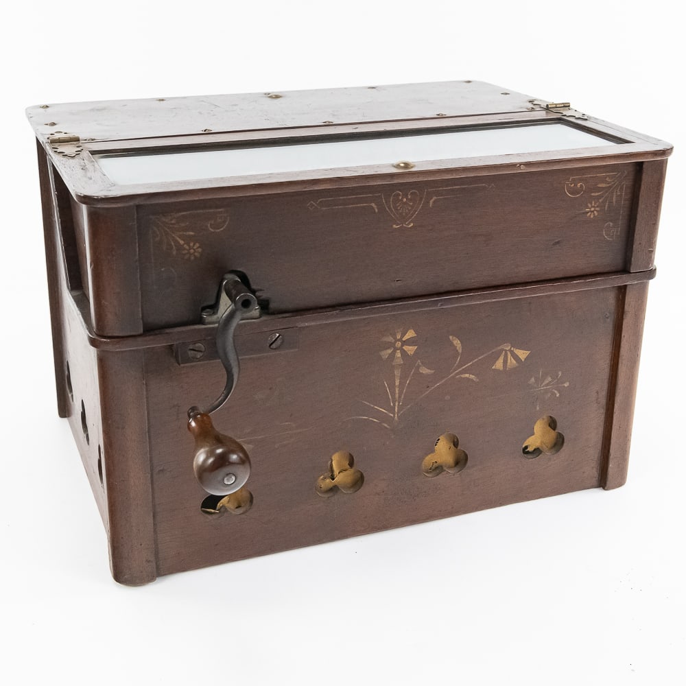 Roller Organ by Autophone Company: This organ in its walnut cabinet has its original finish and stenciling in fair original condition. Stenciling is well worn as well as it has a few scrapes and marks on the cabinet. See photos. Access