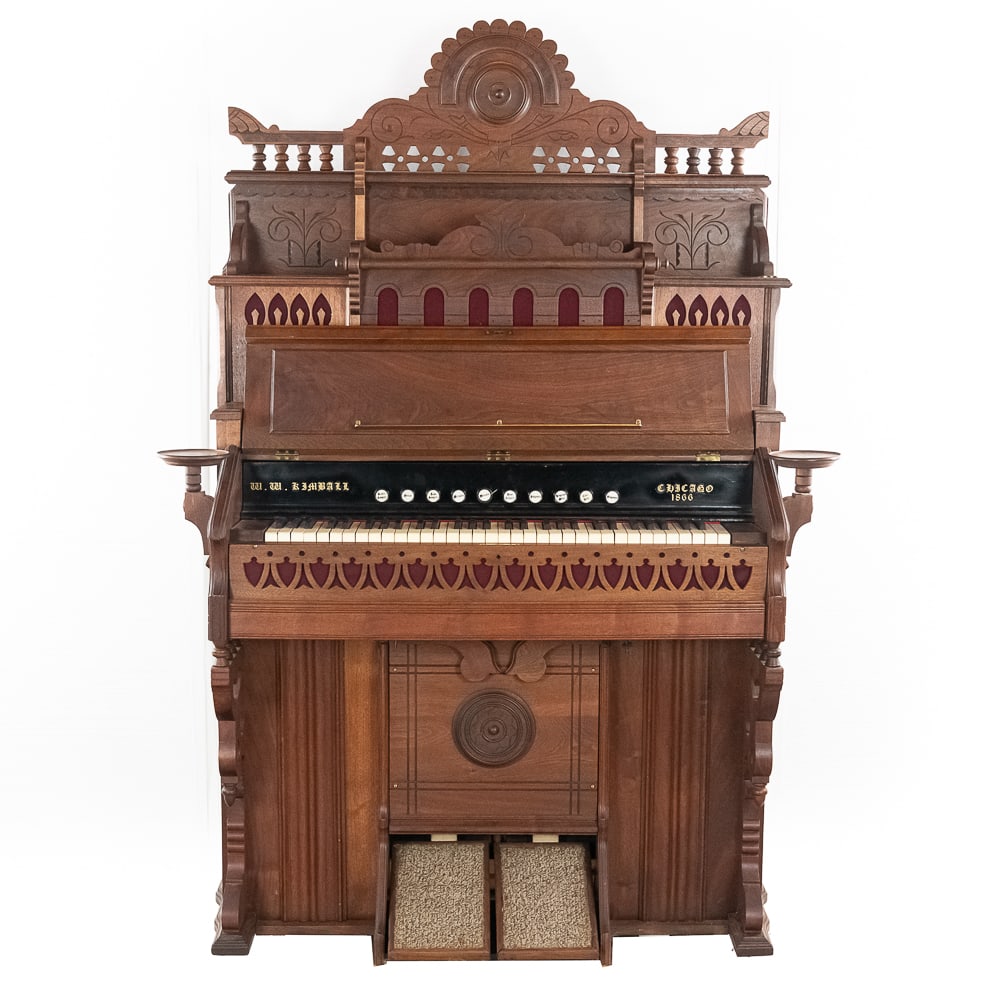 WW. Kimball Pump Organ: *NO SHIPPING - PICKUP OR BUYER ARRANGED TRANSPORT ONLY*10 stop pump organ in working condition. Has beautiful east lake style marquee. Has dual lamp holders on the side, 1 needs to be re-glued.