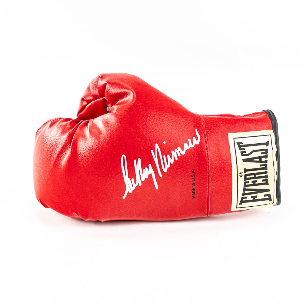Leroy Neiman Autographed Everlast Boxing Glove: Hard to come by legendary artist Leroy Neiman autographed left red Everlast boxing glove. Perfect addition to your collection; great gift idea. Please use photos to judge condition and bid accordingly