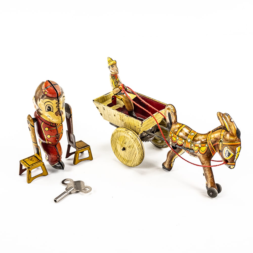 MARX Tin Litho Donkey Wagon & Tumbling Monkey: Collection includes vintage MARX wind up tin litho Donkey & Wagon (winds and works), MARX Tumbling Monkey wind up tin litho (winds and works mismatched key). In very good to good overall condition wit
