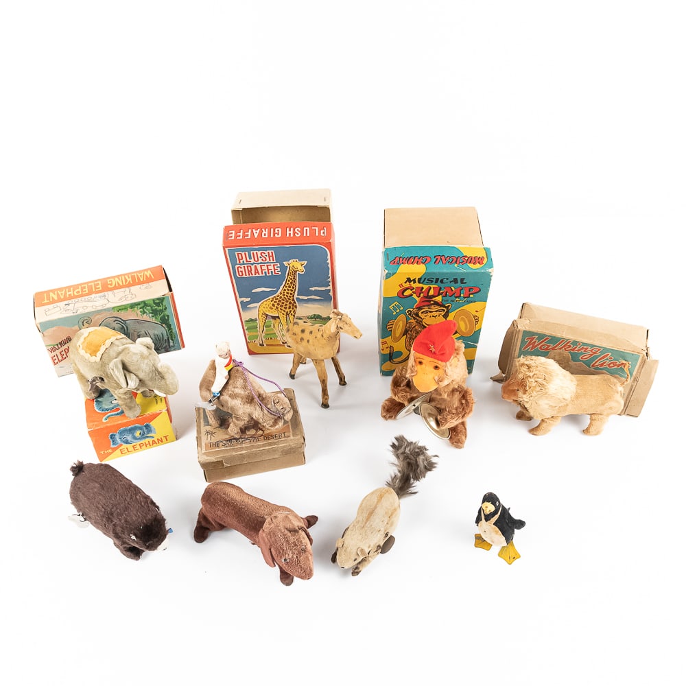 Collection of Assorted Vintage Wind Up Plush Toys: Collection features "The Elephant" Japan wind up toy with original box, Original Walking Elephant empty box, vintage National Toy occupied Japan wind up "Walking Lion" w original open box and key, 195