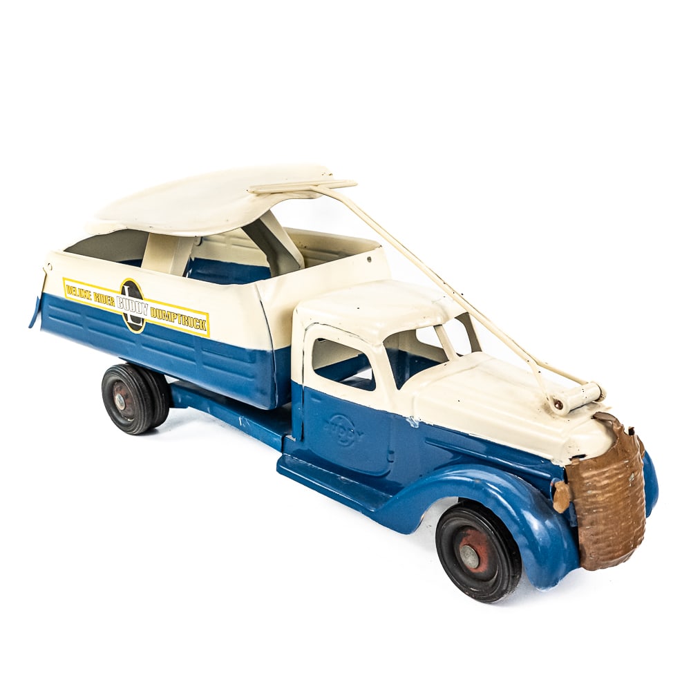 1940s Buddy L Deluxe Ride Em Toy Dump Truck: Eye catching restored Buddy L ride em Deluxe Rider Dump Truck ride on pull toy. Approximately 24" long and in very good overall condition (older restoration) with some minor cosmetic imperfections suc