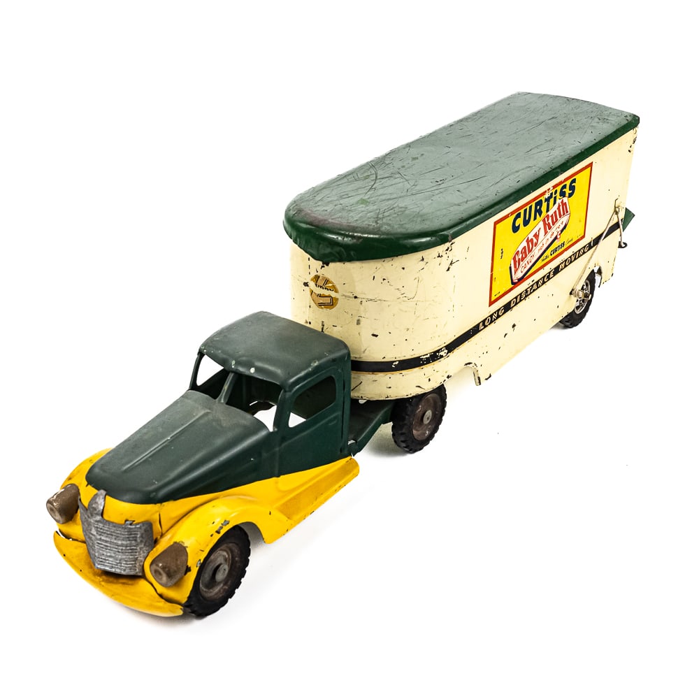 '50s Buddy L Curtiss Candy Pressed Steel Toy Truck: Hard to come by 1950s Buddy L Curtiss Baby Ruth Butter Finger pressed steel long distance toy delivery truck. Good overall condition with cosmetic blemishes associated with age and use including scuff