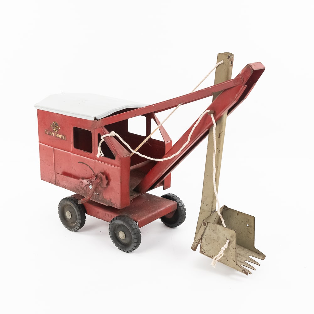 Vintage Buddy L Pressed Steel Toy Steam Shovel: Vintage Buddy L pressed steel toy steam shovel. Approximately 18" long and in good overall condition with moderate cosmetic imperfections including discoloration, rust, scuffs & scratches. Original gr