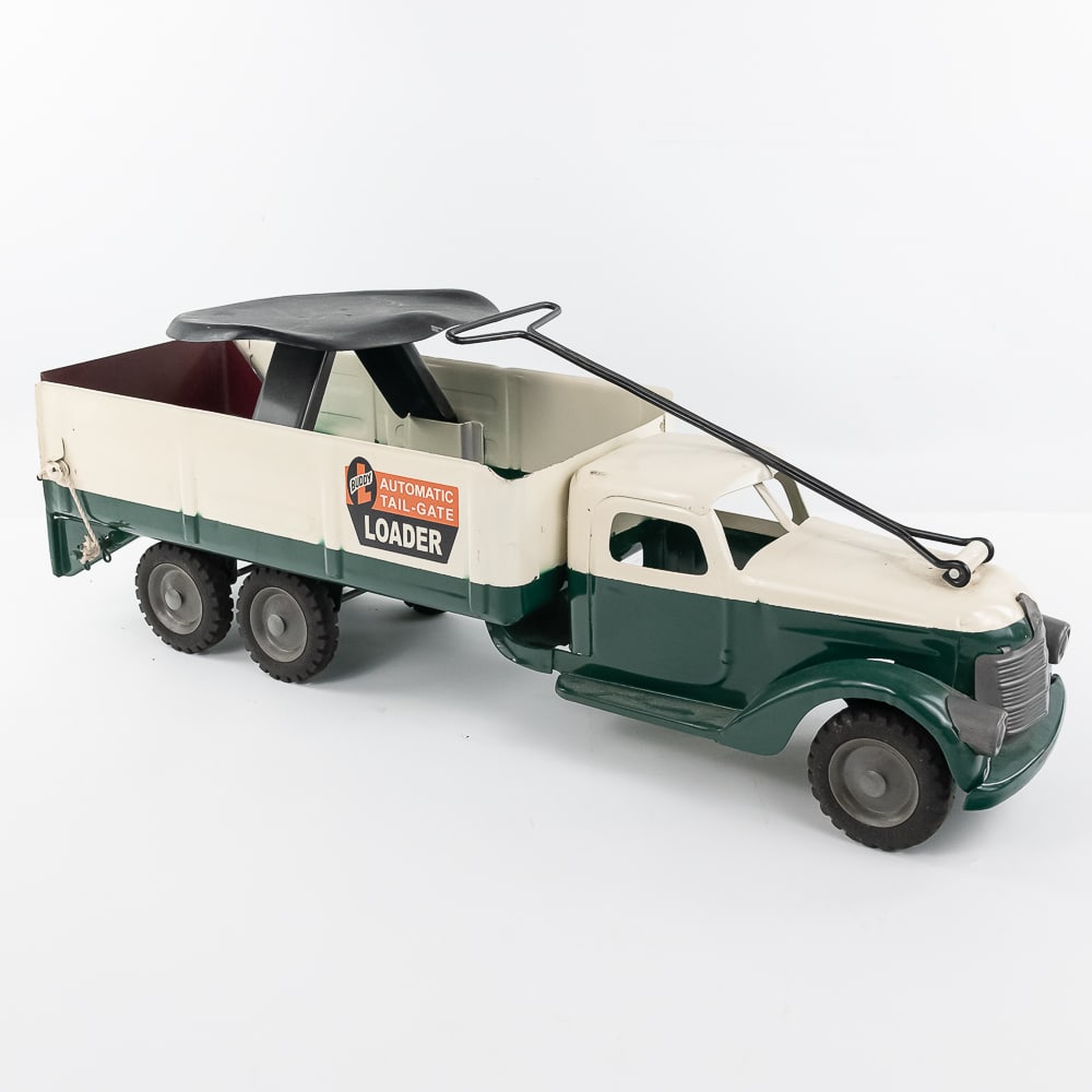 Buddy L Automatic Tail Gate Loader Pull Toy Truck: Hard to find Buddy L Curtis pressed steel pull toy automatic tail gate loader truck. Approximately 25" long and in very good overall condition with some minor cosmetic imperfections associated with ag