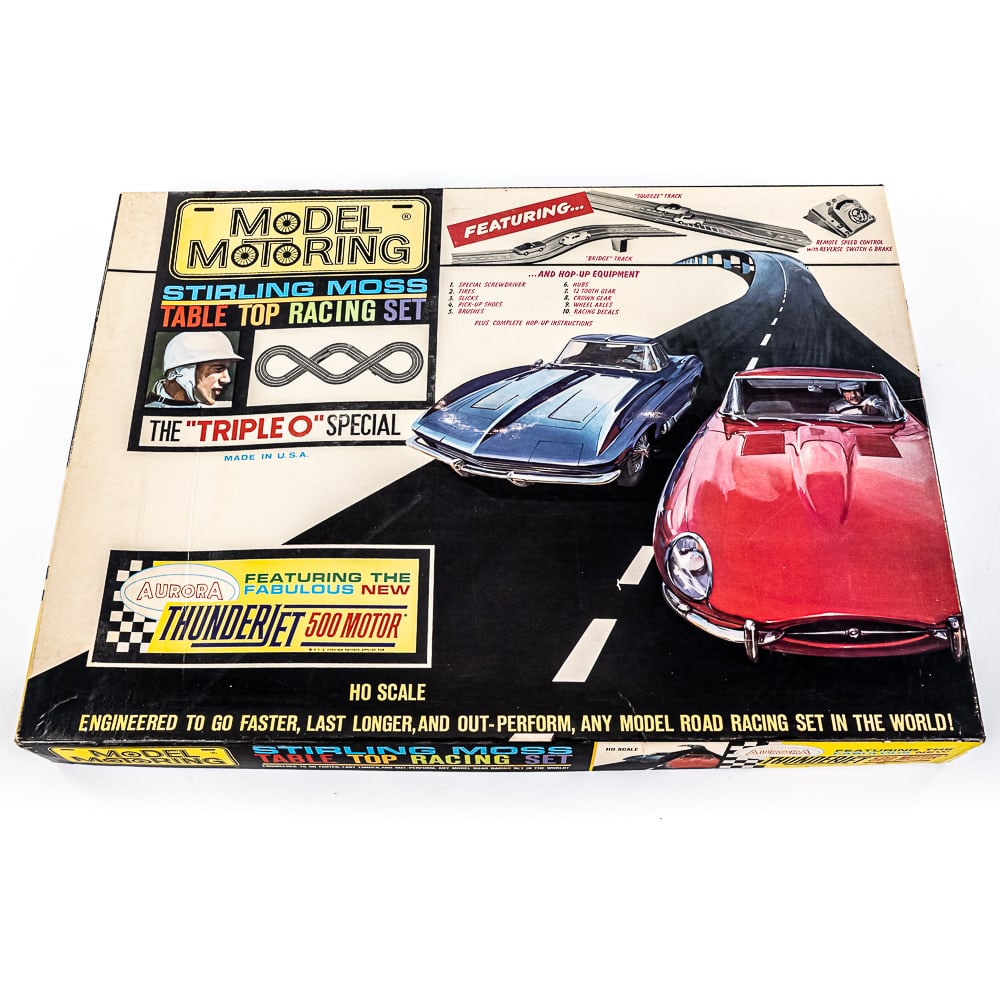 NOS Aurora Model Motoring Stirling Moss Thunderjet: 1963 Aurora Model Motoring Stirling Moss Thunder Jet 500 "Triple O" special table top racing set. Excellent overall condition; still showcased inside original opened packaging. Everything still sits w