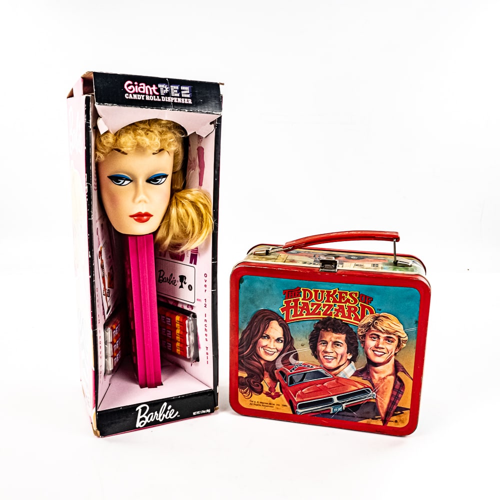 Vintage Dukes of Hazzard Lunch Box & Barbie Pez: Collection features vintage Dukes of Hazzard lunchbox (no thermos) along with Giant Barbie PEZ still showcased inside original packaging. Lunchbox in good overall with some age and wear related cosmet