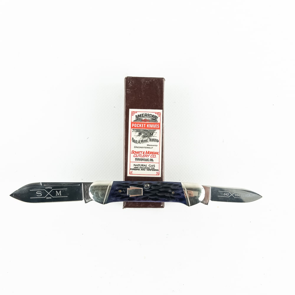 Schatt and Morgan Blue Bone Canoe Knife w/Box: Schatt and Morgan Model# 042264 Canoe Knife with Dark Blue Bone Handles. Knife is Brand New in box never carried with only storage wear on bolsters. Very rare limited production. USA made Pocket knife