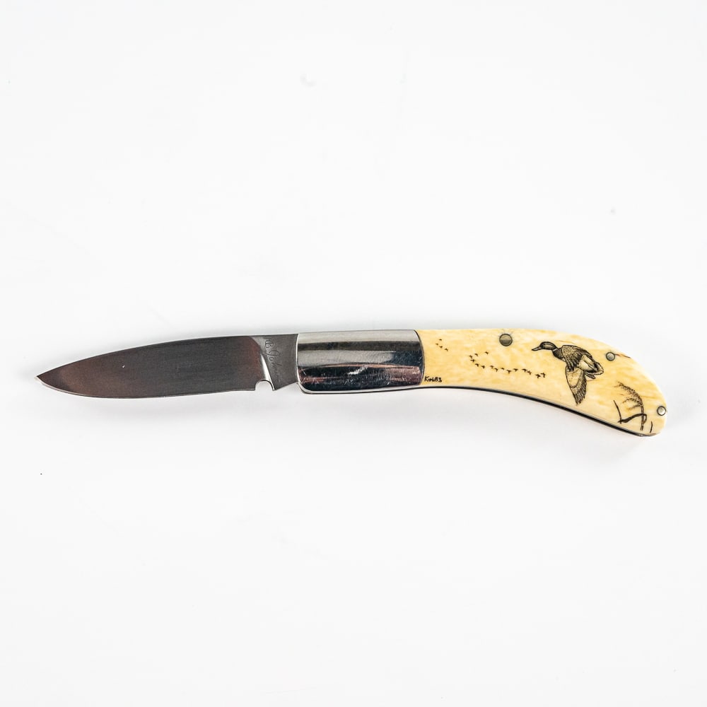 R. B. Johnson Custom Scrimshaw Slipjoint Knife: Excellent Scrimshaw ivory handle custom knife hand made by R. B. Johnson of Minnesota. Knife is elaborately decorated on ivory handles with scrimshaw of ducks with engravers signature on handles and m