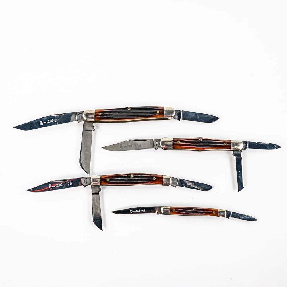 Queen Steel #9, #48, #43, & #26 Knives: 1 each of 4 different models. Excellent high Quality USA made Queen Steel knives. Bone style delrin handles with stainless bolsters. Nice older production knives are all in excellent used condition.