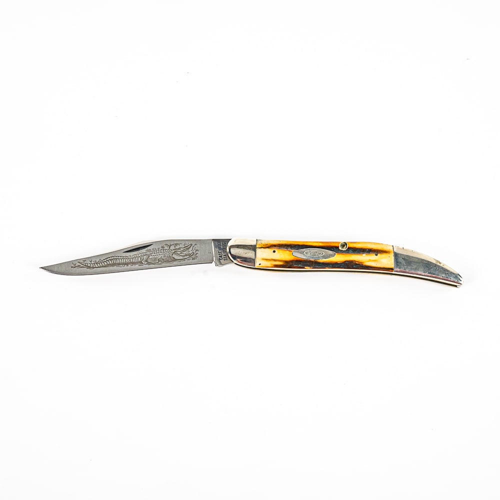 Case XX 51093 SSP Gator Folding Knife: 1970s CASE XX Model 51093 SSP Gator Laser Etch Tooth Pick style knife. 4" Blade 8.75" OAL. Knife is unused with no edge damage, but minor storage wear. See photos.