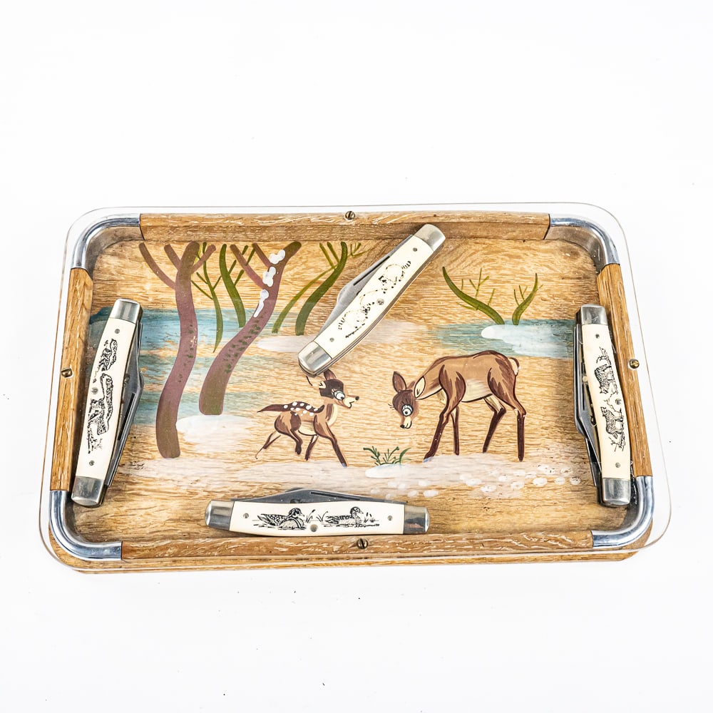 4 Schrade Scrimshaw Collector Knives: 4 Schrade SC505 Scrimshaw Collector Pocket Knives. Knives are hand-done scrimshaw carvings on delrin handles. Each knife features a different animal, Duck, Badger, Raccoon and Wolf. All Knives are lik