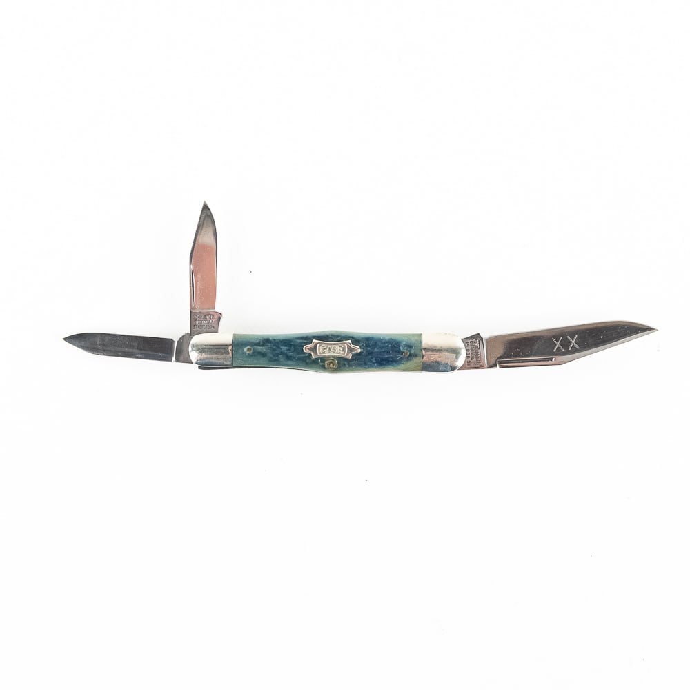 Case XX 63083 Bone Whittler 1/158 Knife (1990s): 1 Case XX USA Model 63083. Limited production 1 of 158 made in 1993. Limited production knife is like new with only minor storage wear on bolsters. Very nice high quality US made knife with Blue bone